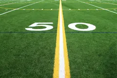 The 50-yard line, close up on turf